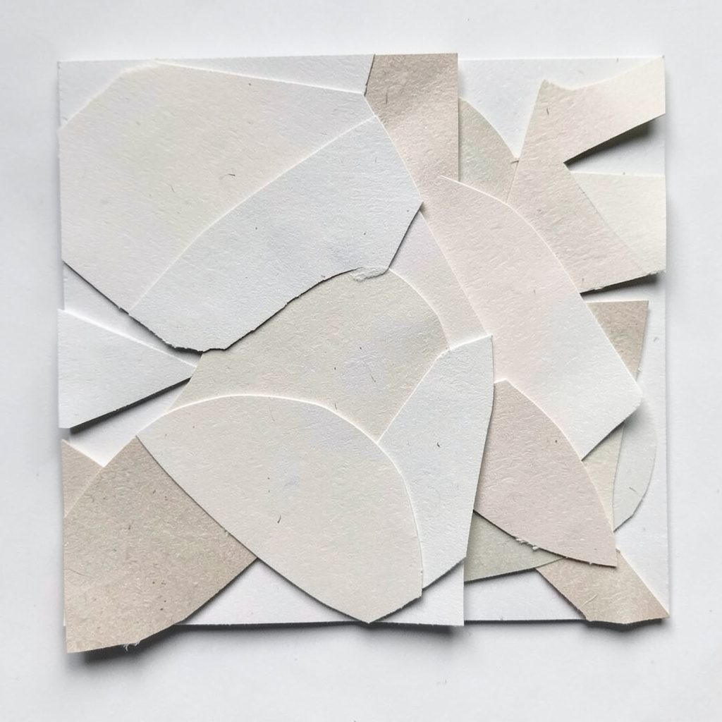 Layered paper cut-out of a glowing message envelope against a dark blue night backdrop